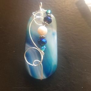 Polished stone pendant